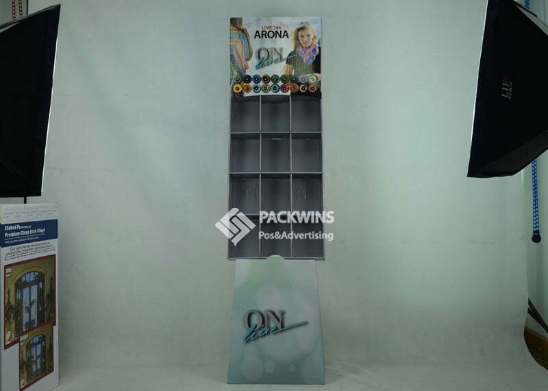 A brand manager presenting packaging and display mockups to a retail buyer