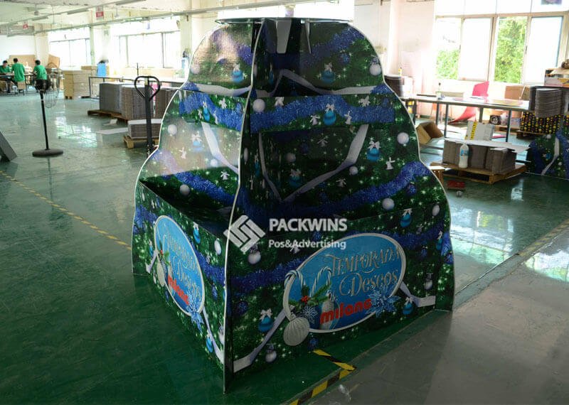 Branded cardboard retail display matching product packaging design.