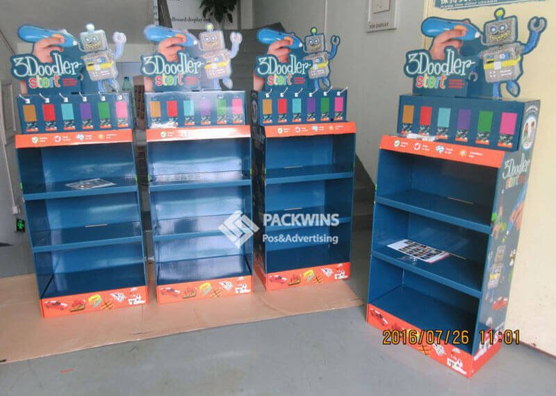 A collage of various custom cardboard retail displays for different products