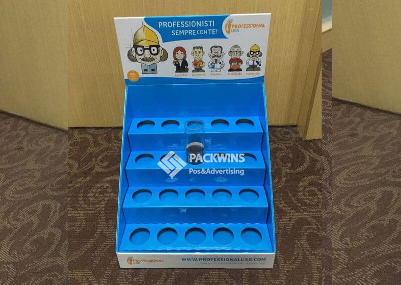 A series of corrugated cardboard POP displays in a retail aisle, all with consistent branding but showcasing different products