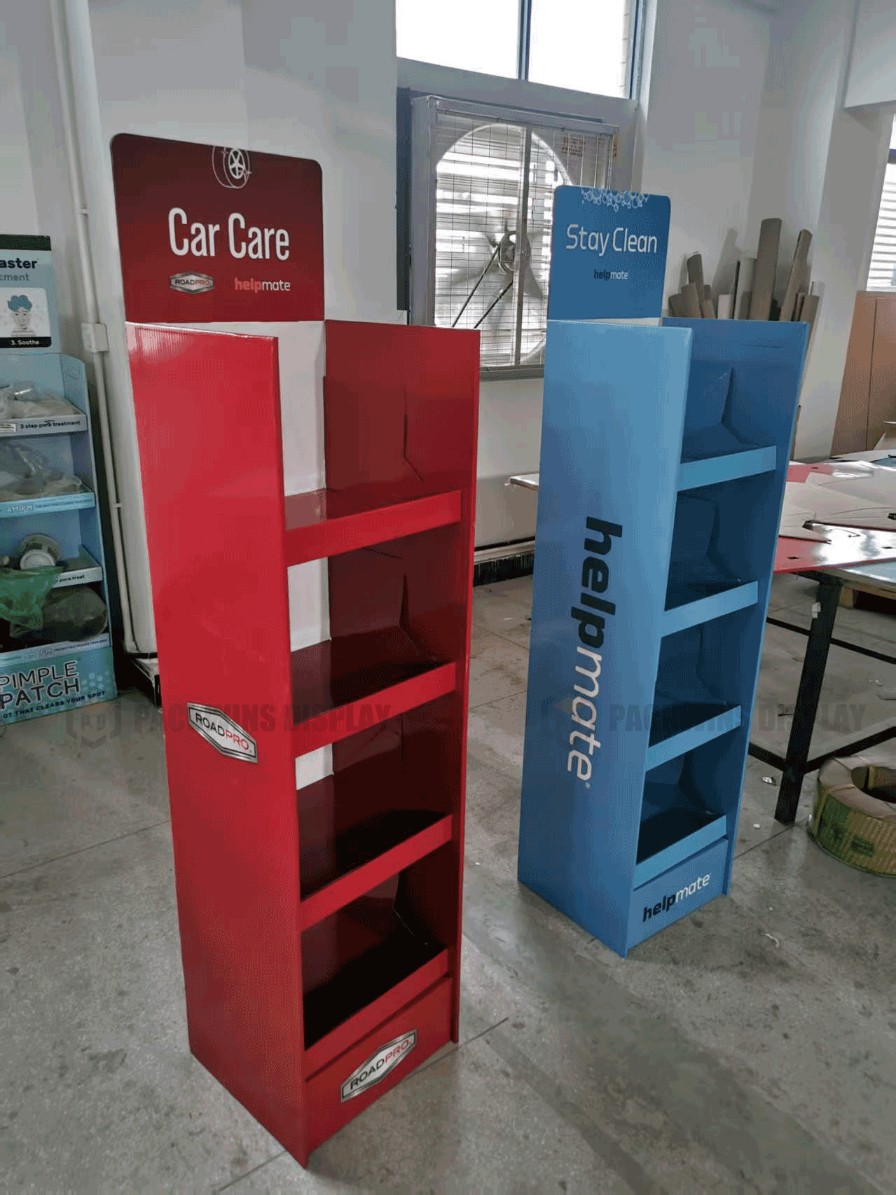 Strategic Display Placement A product display strategically placed at the end of a busy retail aisle